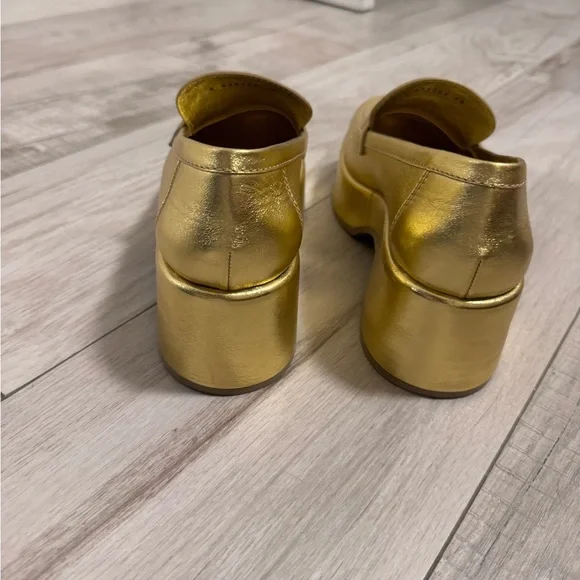 CHANEL Gold Flats Luxurious Metallic Loafers